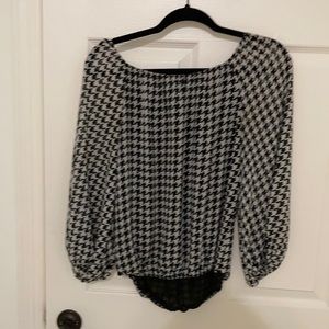 An off the shoulder top with an adorable pattern
